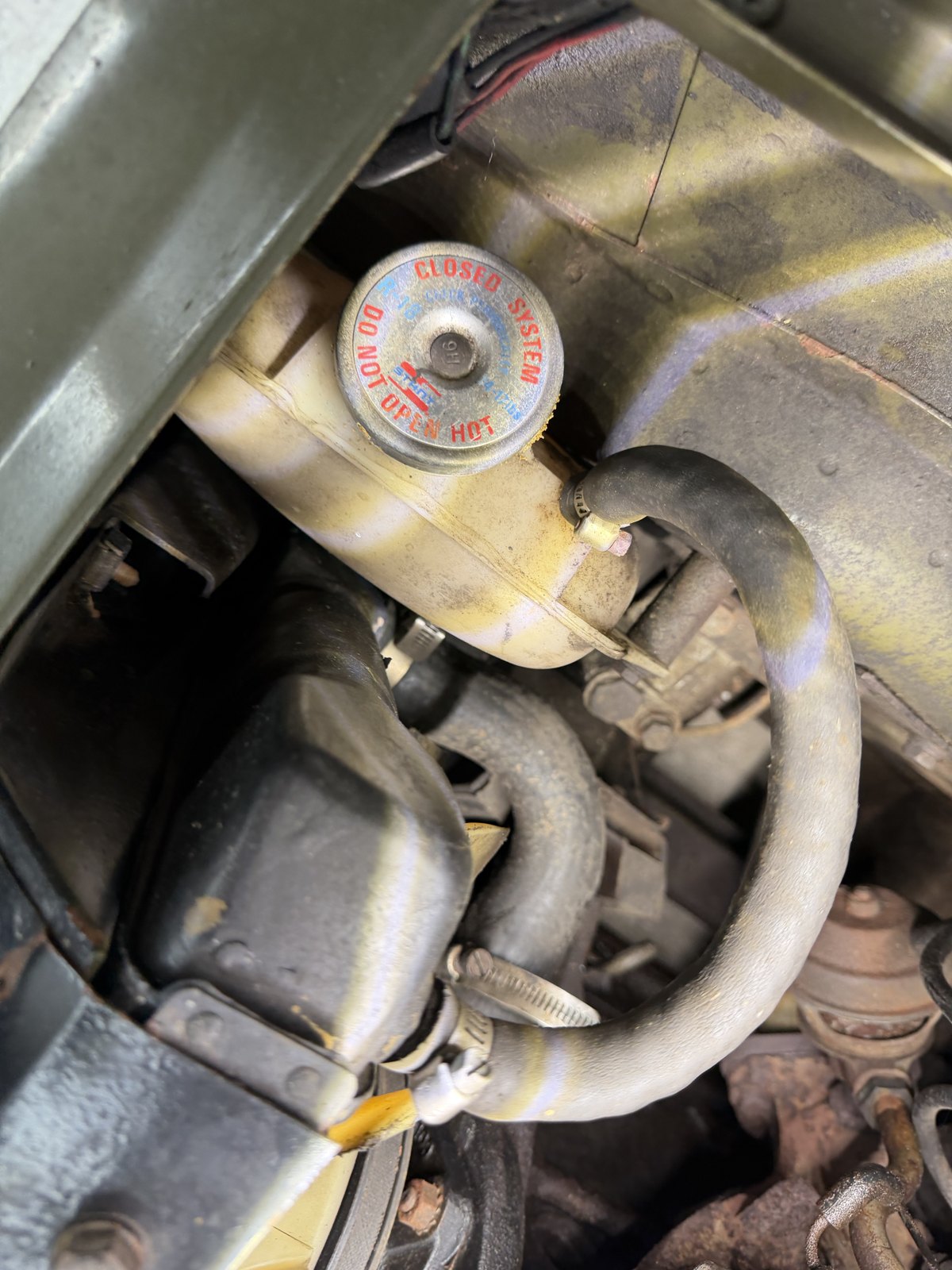 Owner close-up of the Midget expansion tank and pressure cap