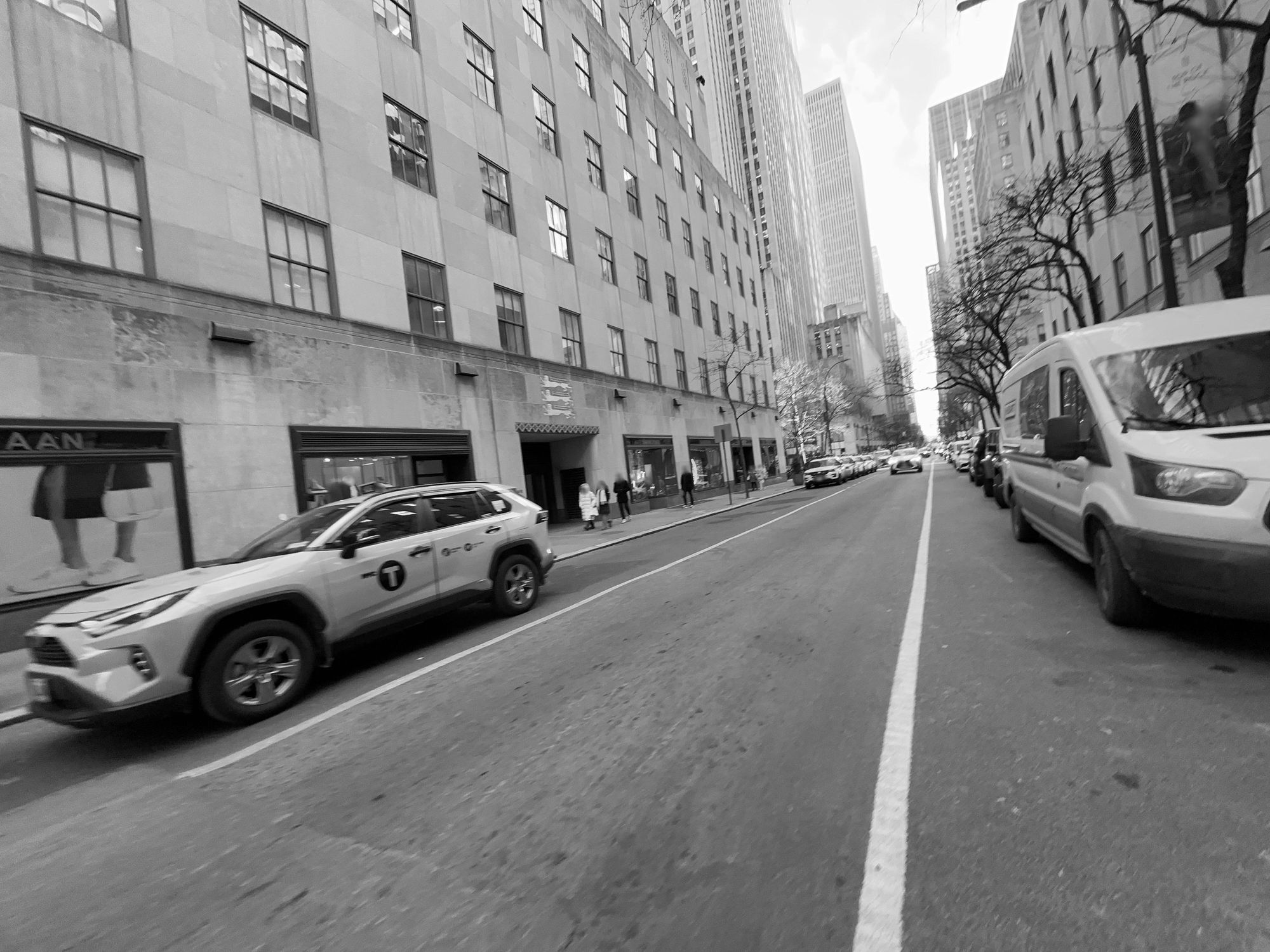 Recent street photograph near 37 West 50th Street, New York City; present streetscape